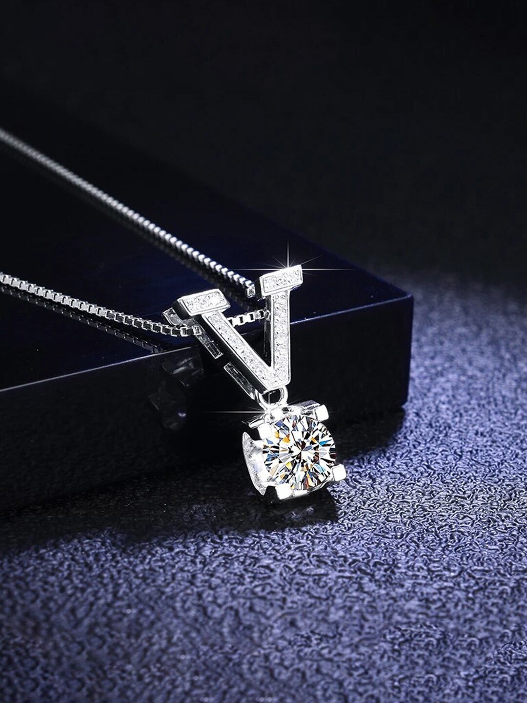 

Jewels Galaxy Silver-Plated Crystal Stone-Studded V Shape Circular Pendant With Chain