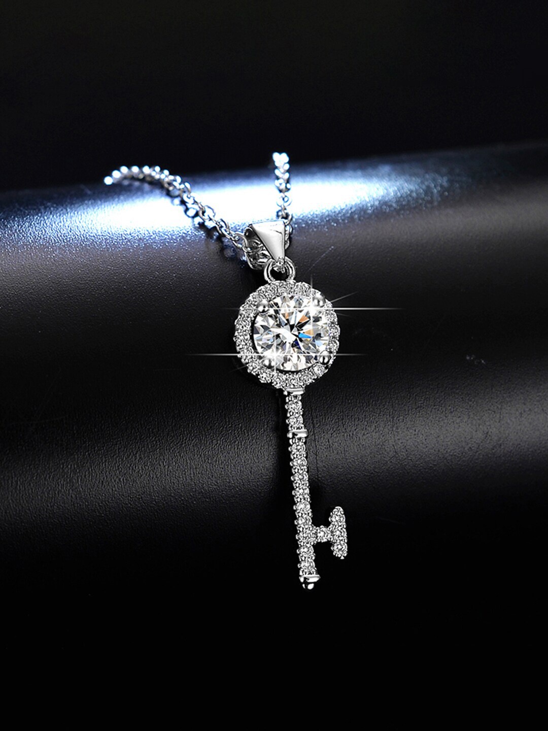 

Jewels Galaxy Silver-Plated Crystal-Studded Contemporary Pendant