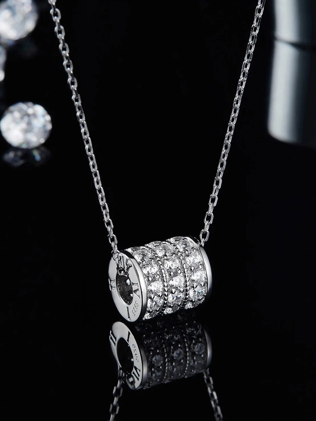 

Jewels Galaxy Silver-Plated CZ-Studded Anti Tarnish Cylindrical Pendant With Chain