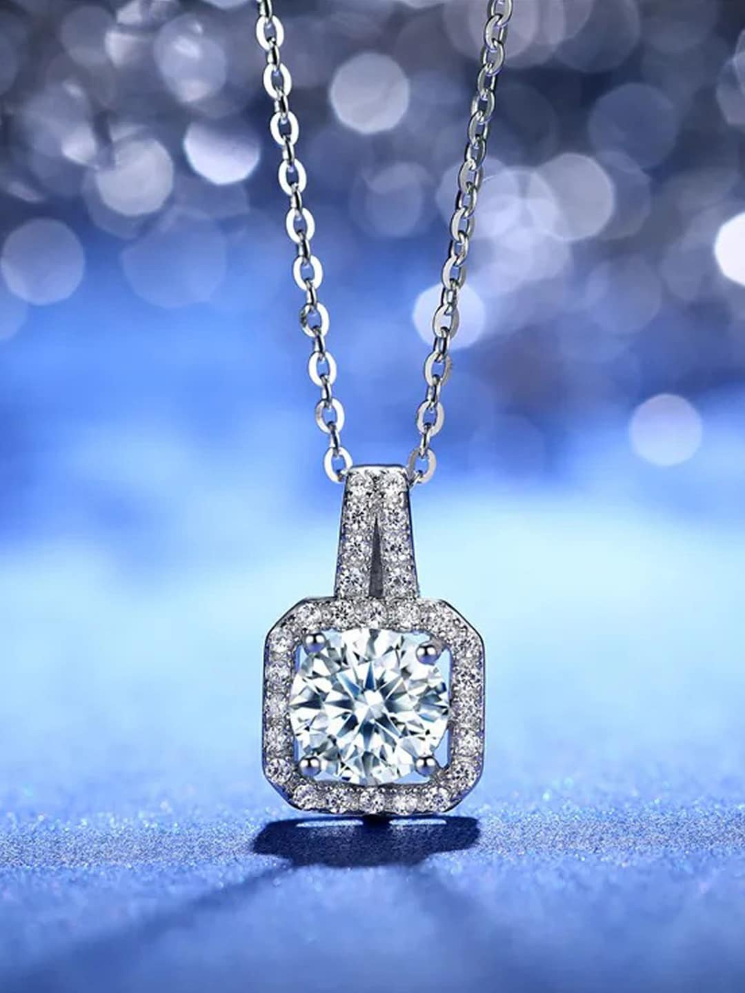 

Jewels Galaxy Silver-Plated Cubic Zirconia Studded Pendant With Chain