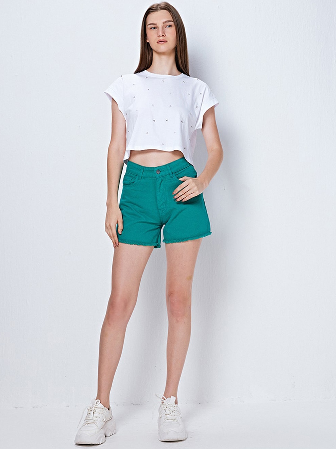 

COVER STORY Women Green Mid-Rise Shorts