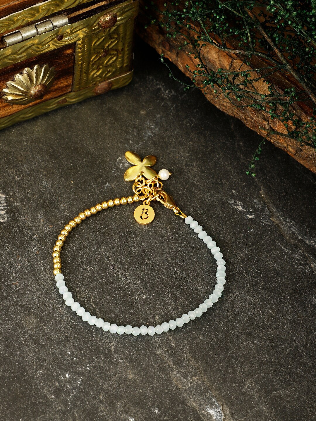 

Berserk Gold-Plated Aquamarine Charm Bracelet