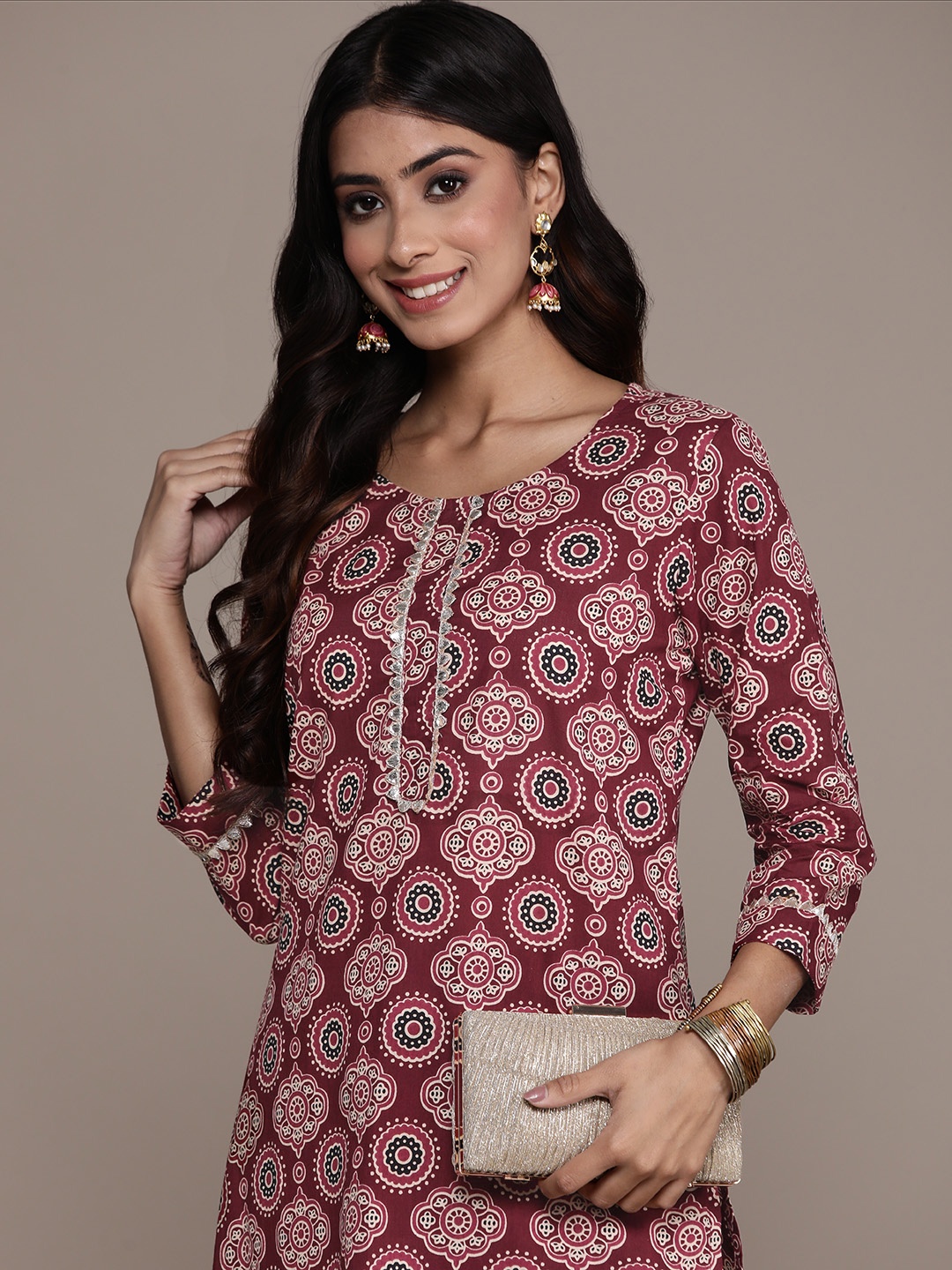 

Anubhutee Women Ethnic Motifs Printed Regular Gotta Patti Pure Cotton Kurta with Trousers, Maroon