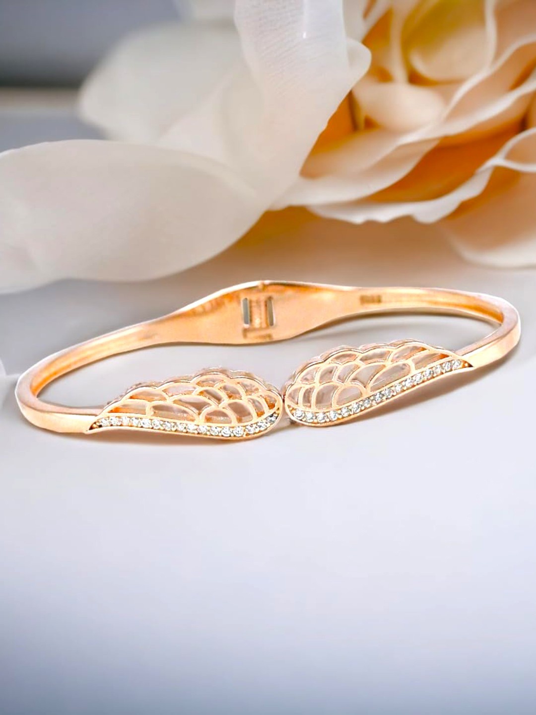 

Taraash Women Rhodium-Plated Rose Gold-Toned Openable CZ Angel Wing Bangle