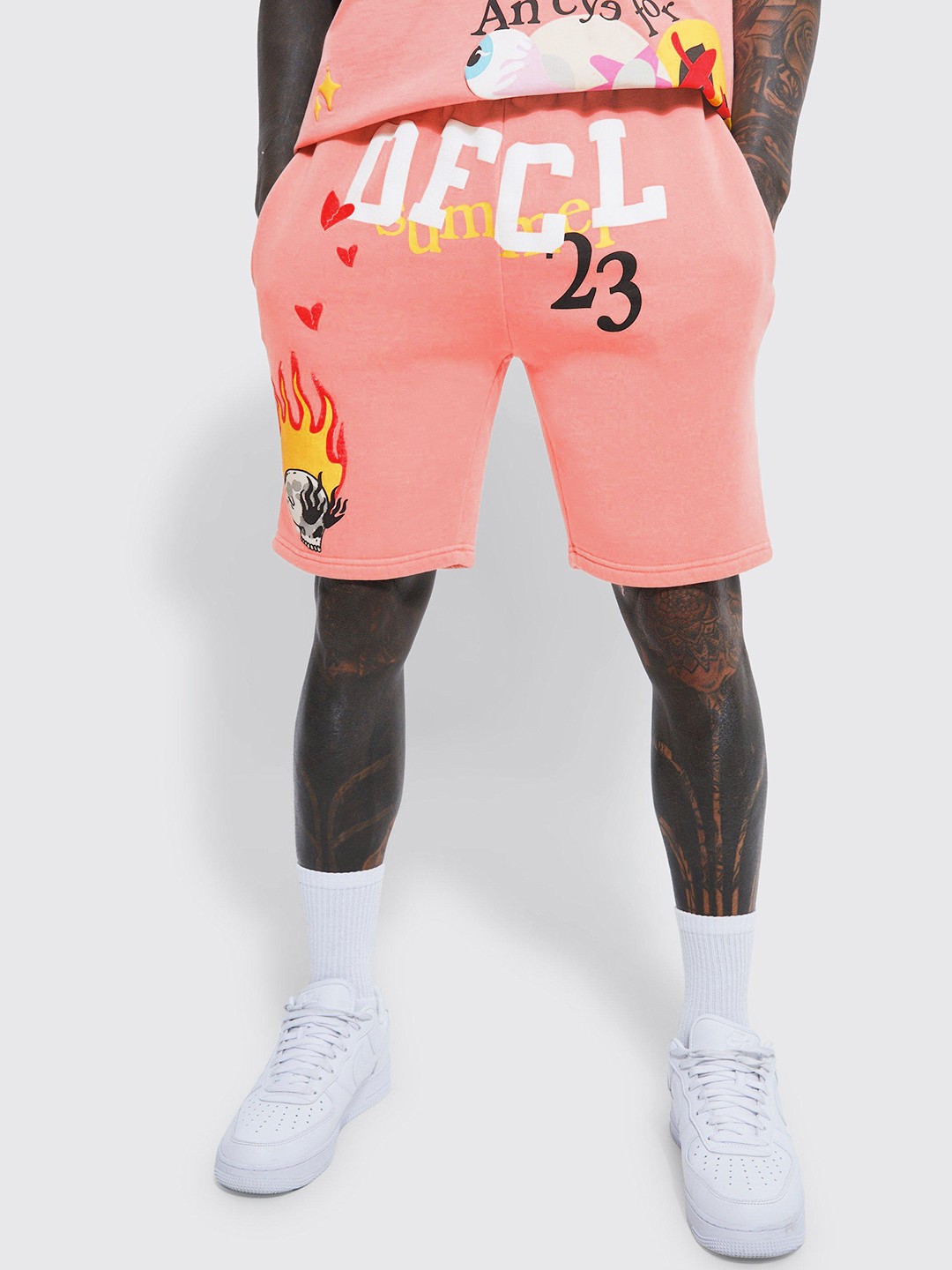 

boohooMAN Typography Printed Loose Fit Shorts, Peach