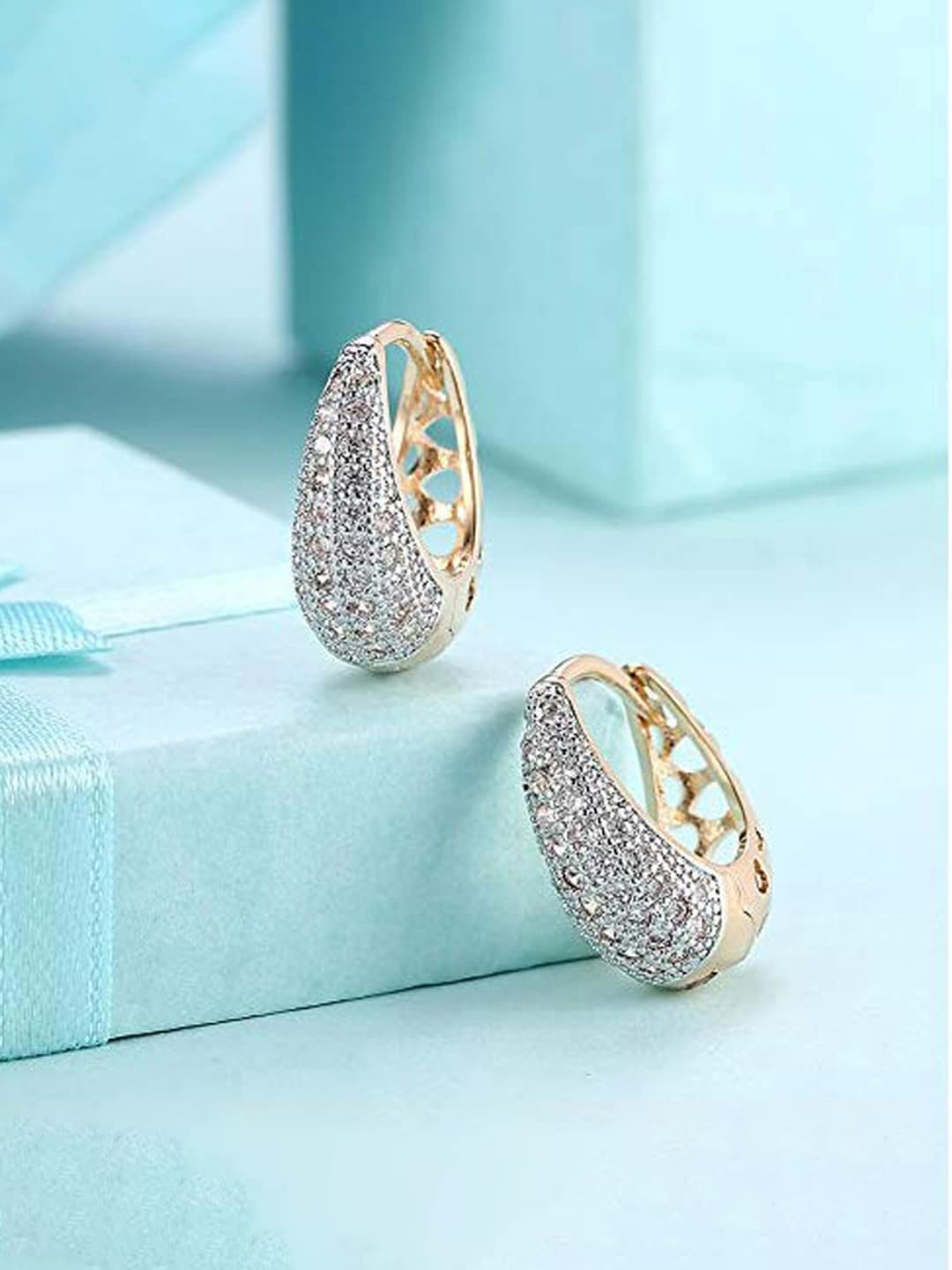 

Jewels Galaxy Gold-Plated American Diamond Studded Teardrop Shaped Hoop Earrings