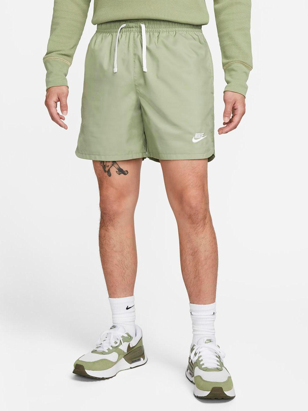 

Nike Men Essentials Sportswear Essentials Woven Lined Flow Shorts, Green