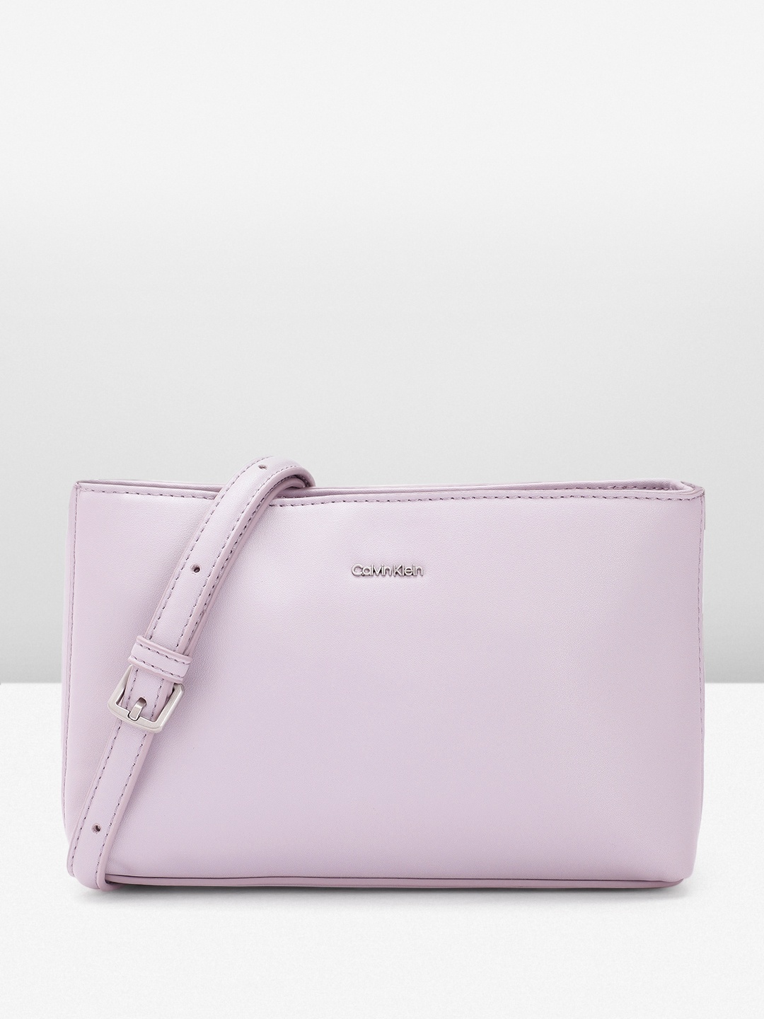 

Calvin Klein Structured Sling Bag, Purple