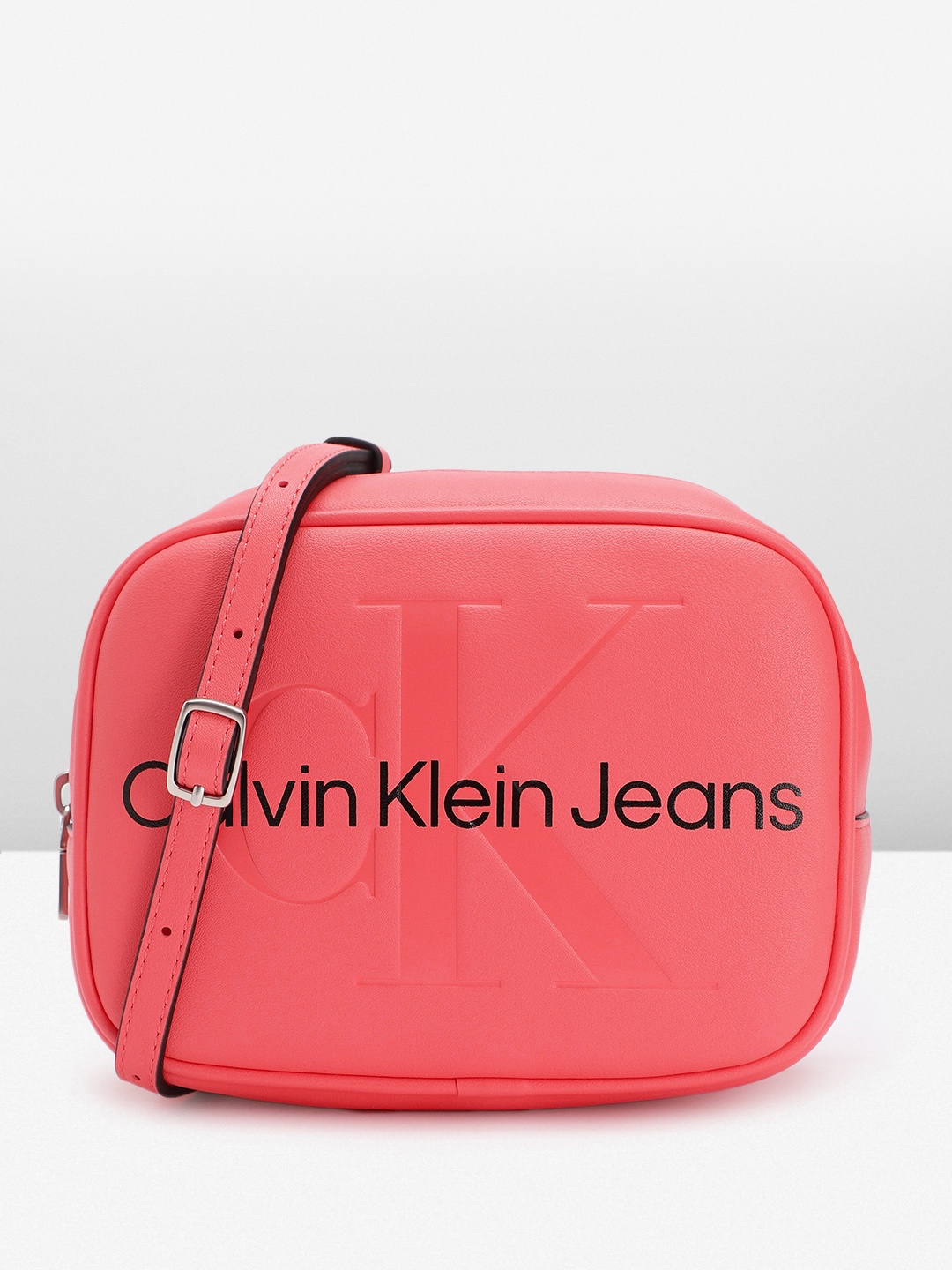 

Calvin Klein Women Brand Logo Printed Sling Bag, Pink