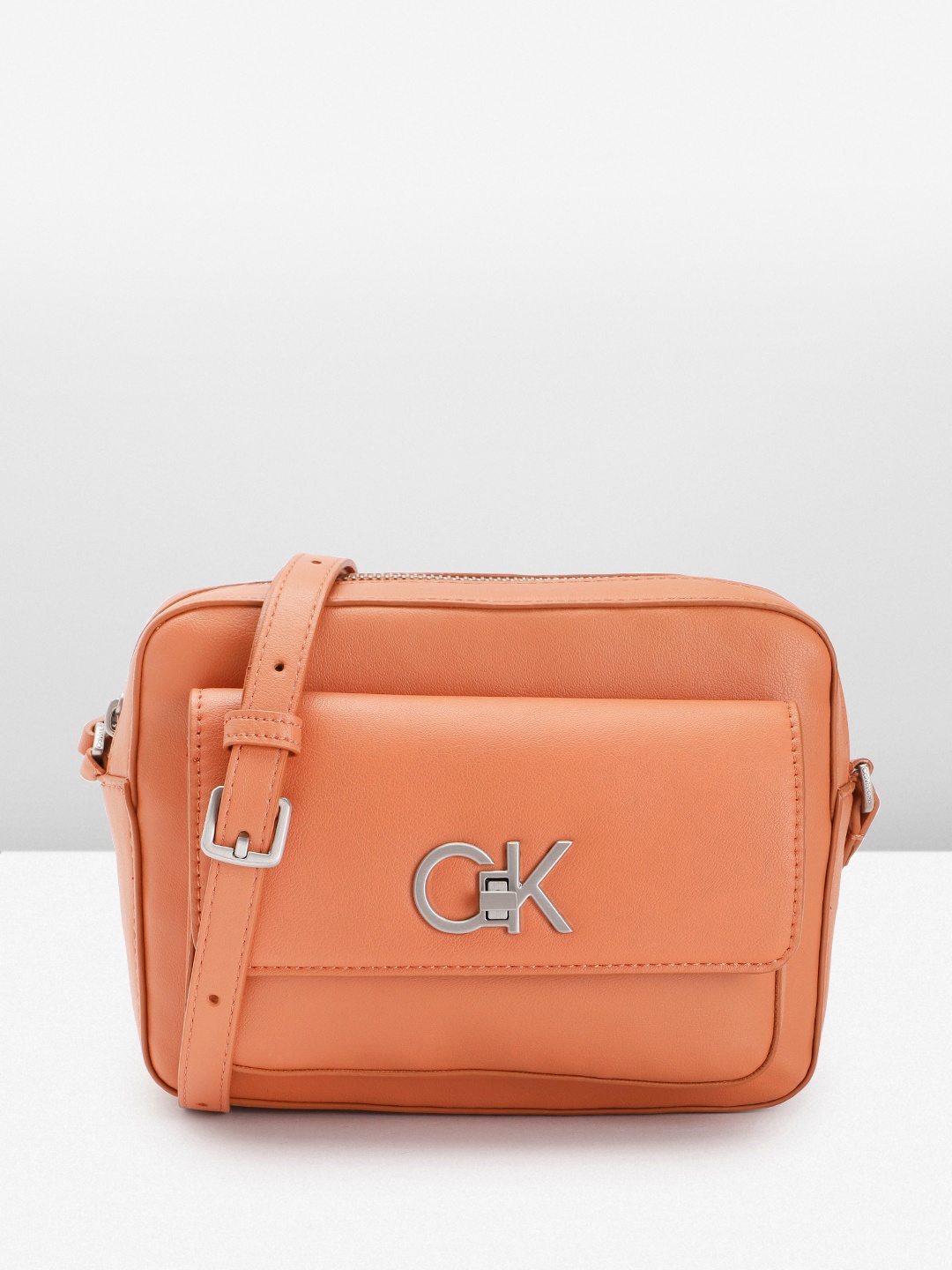 

Calvin Klein Structured Sling Bag, Brown