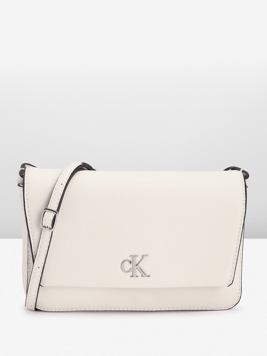 

Calvin Klein Women Solid Sling Bag, White
