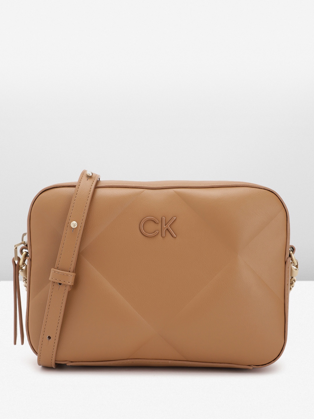 

Calvin Klein Women Quilted Sling Bag, Brown