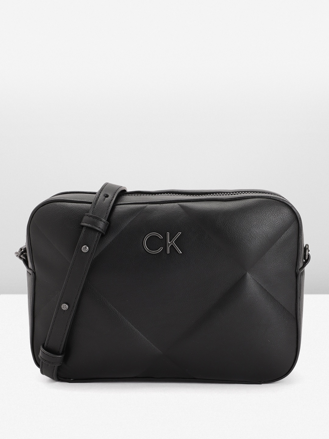 

Calvin Klein Solid Quilted Structured Sling Bag, Black
