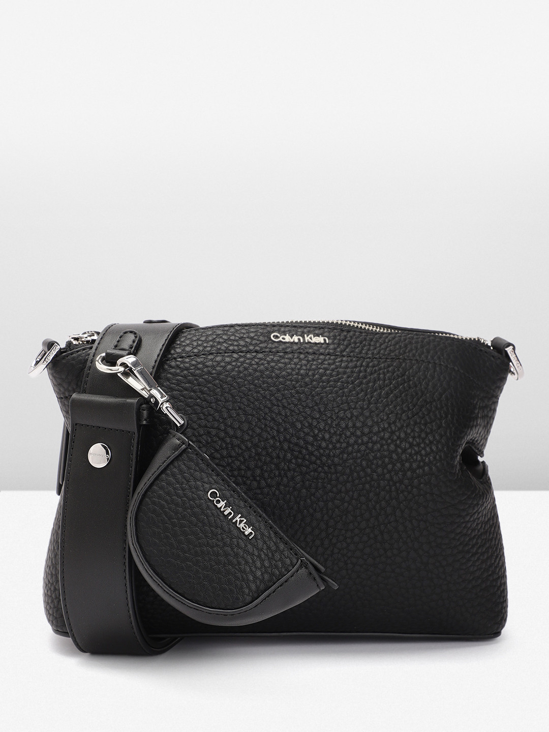 

Calvin Klein Textured PU Structured Sling Bag With A Pouch, Black