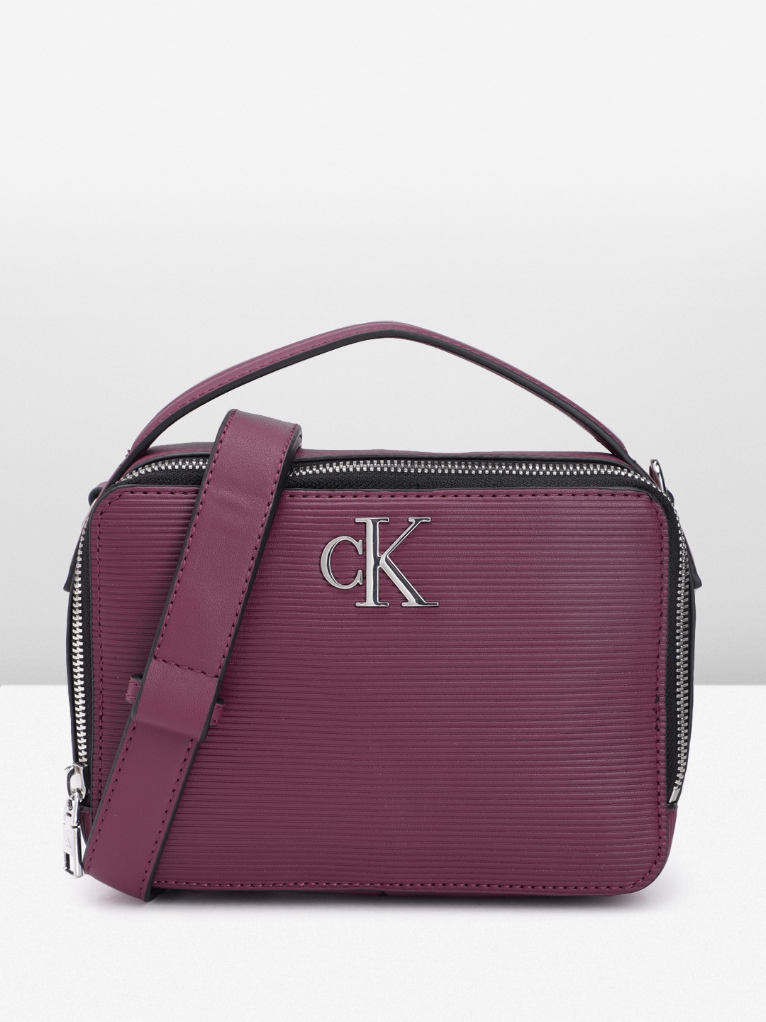

Calvin Klein Structured Sling Bag, Purple