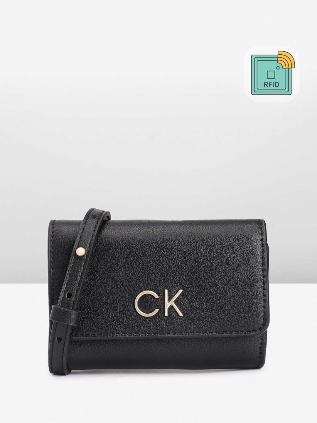 

Calvin Klein Women Solid PU Three Fold Wallet With RFID & A Detachable Sling Strap, Black