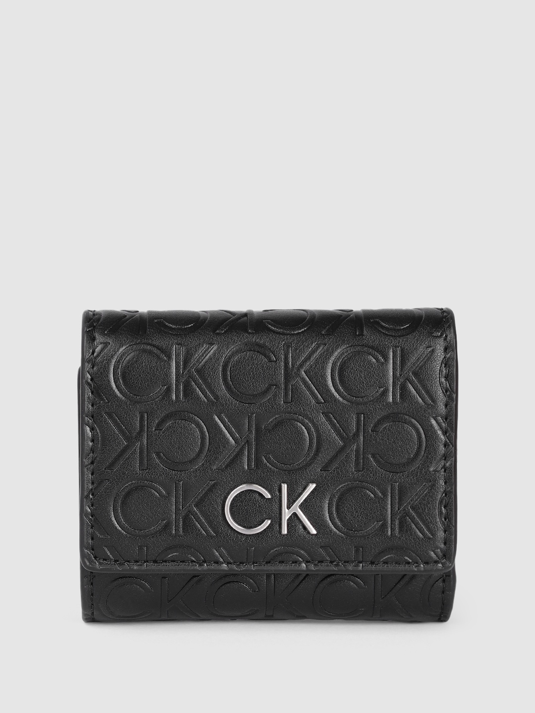 

Calvin Klein Women Brand Logo Textured Three Fold Wallet, Black