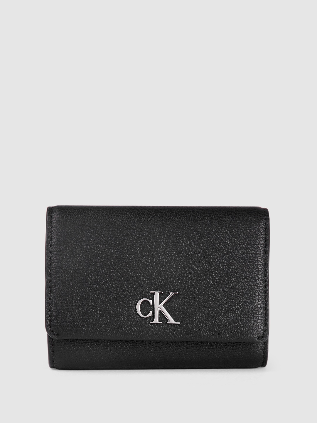

Calvin Klein Women Solid Three Fold Wallet, Black