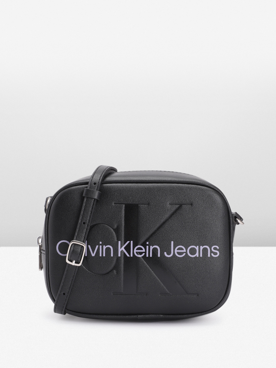 

Calvin Klein Brand Logo Printed Structured Sling Bag, Black