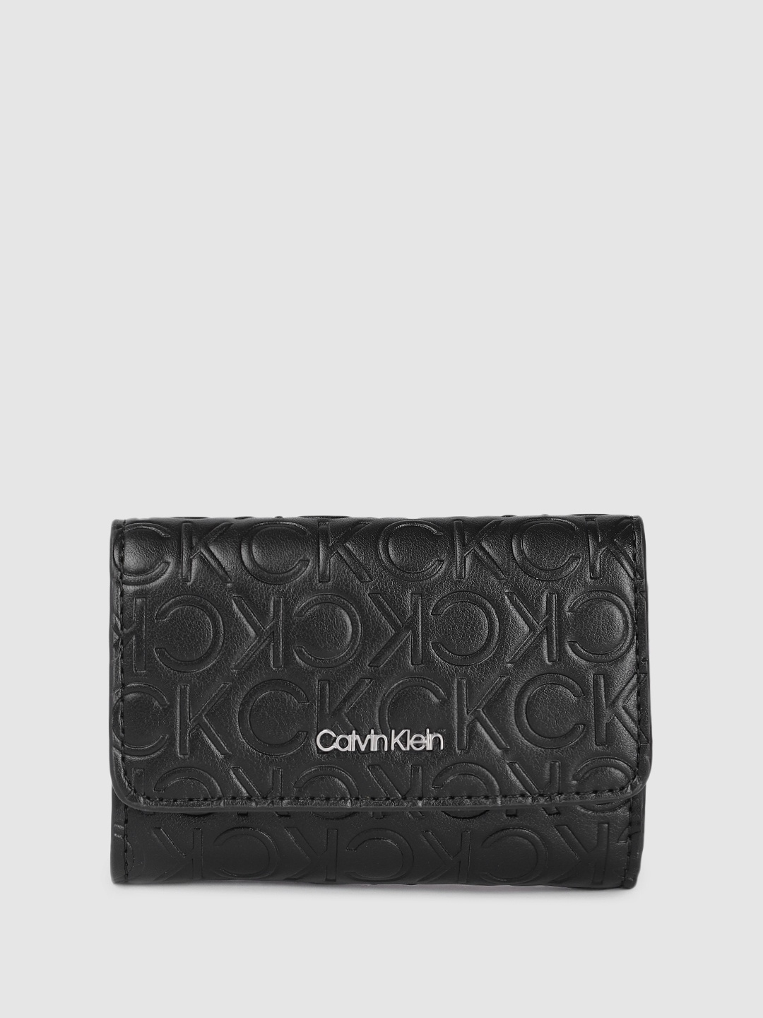 

Calvin Klein Women Brand Logo Textured Three Fold Wallet, Black