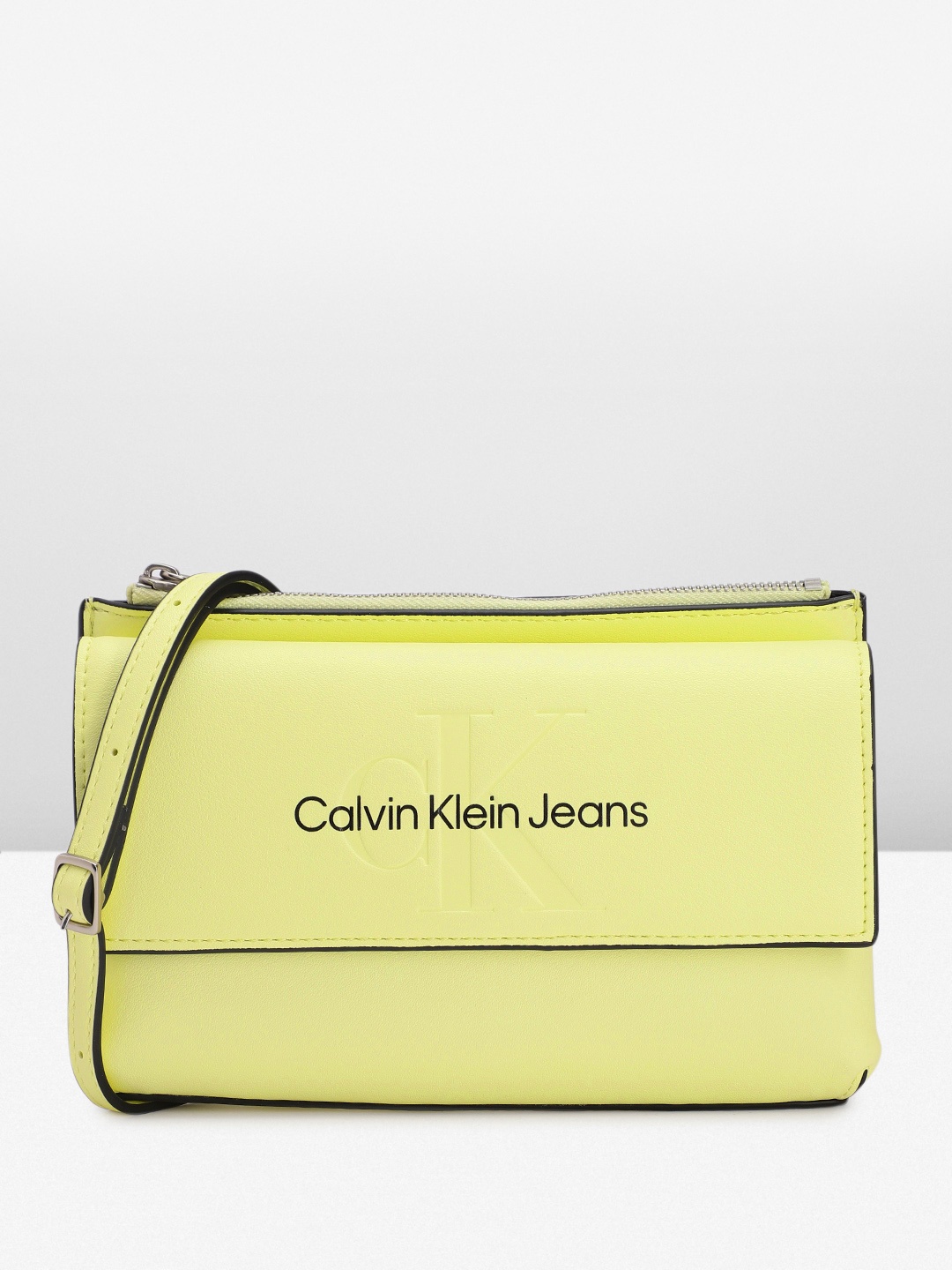 

Calvin Klein Women Brand Logo Printed Sling Bag, Yellow