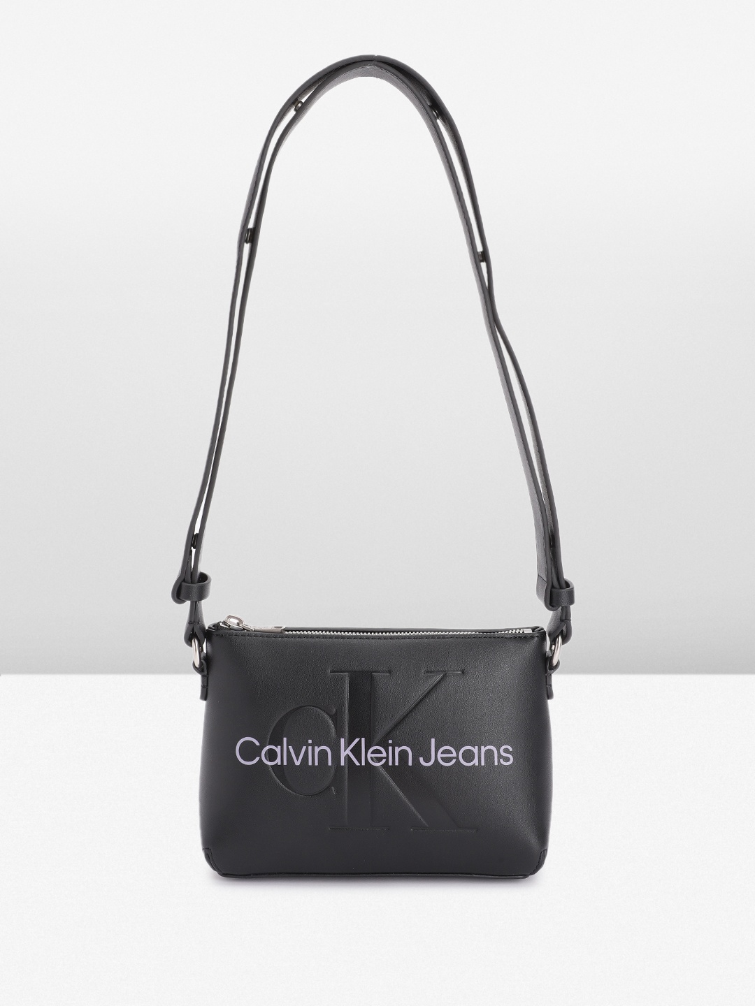 

Calvin Klein Brand Logo Printed Structured Sling Bag, Black