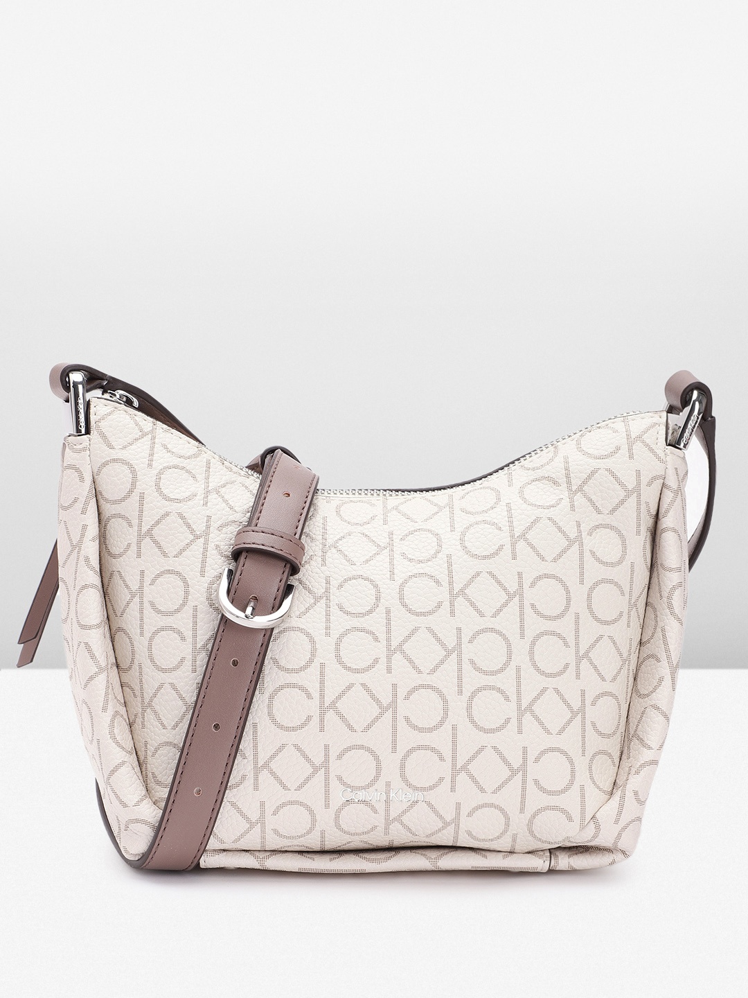 

Calvin Klein Printed Sling Bag, Off white
