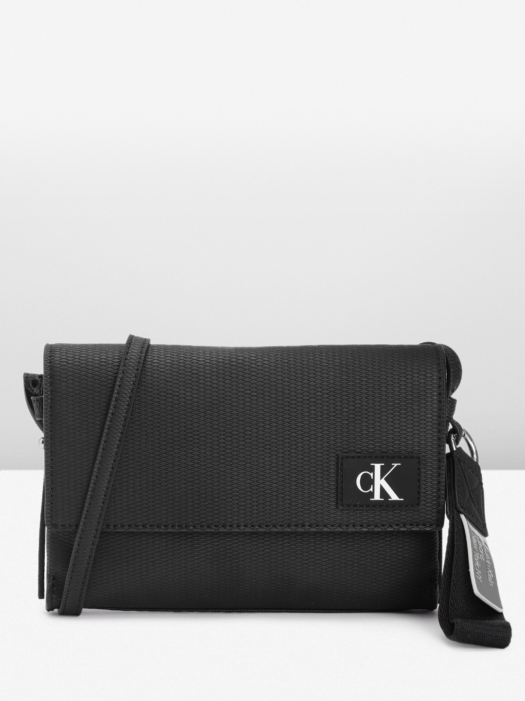 

Calvin Klein Textured Sling Bag, Black