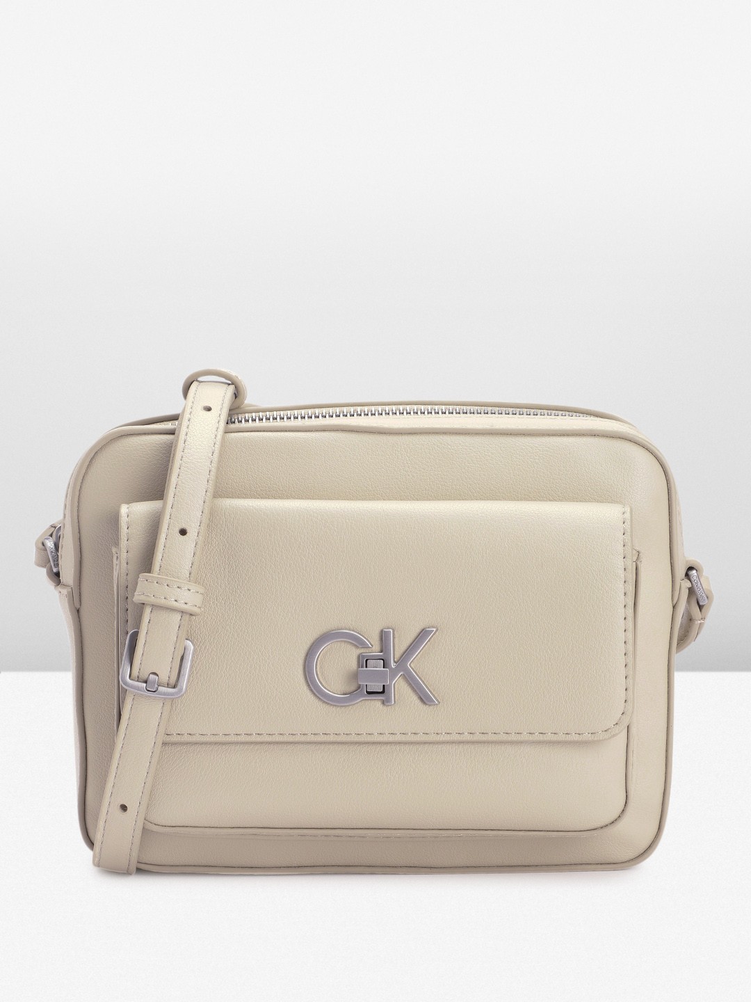 

Calvin Klein Women Solid Sling Bag, Grey