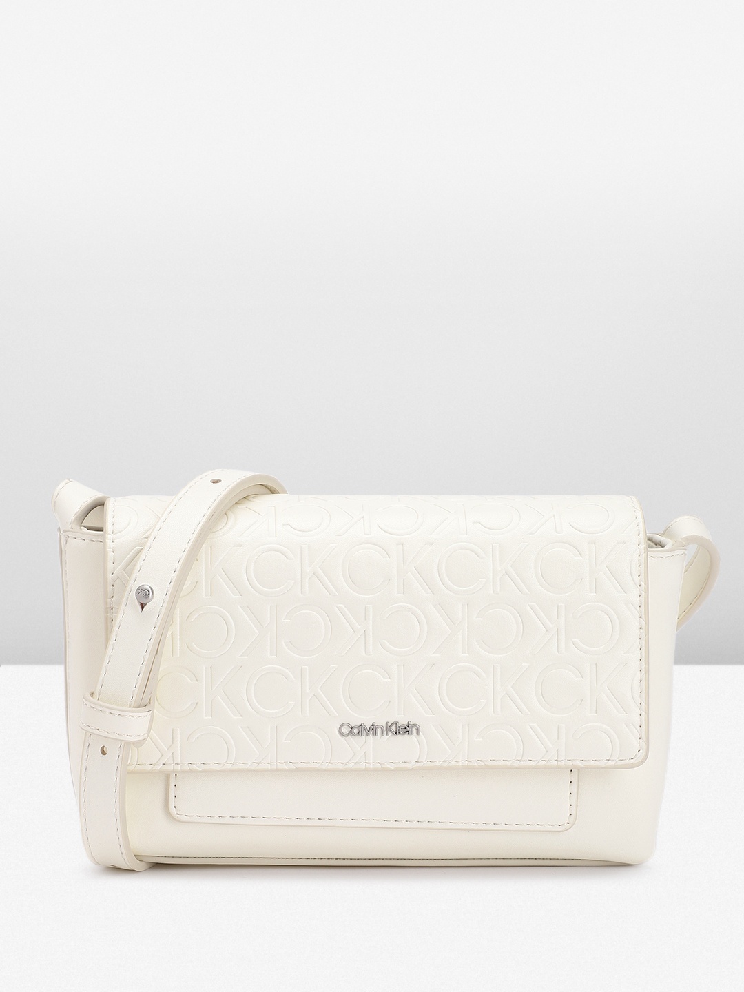 

Calvin Klein Women Brand Logo Textured Sling Bag, White