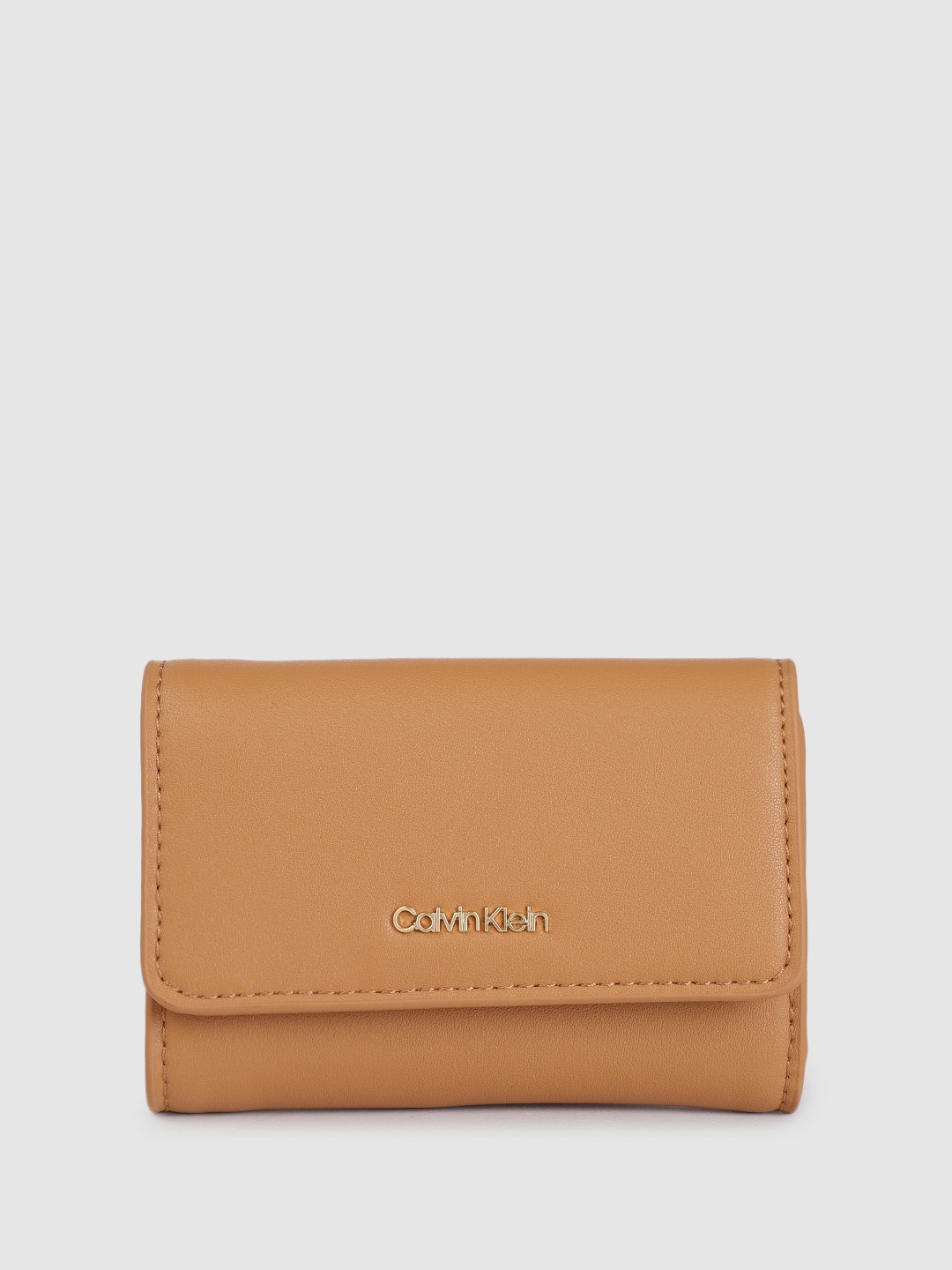 

Calvin Klein Women Solid Three Fold Wallet, Brown