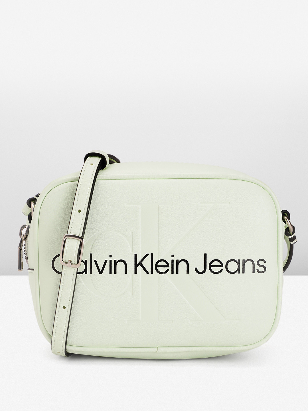 

Calvin Klein Brand Logo Printed & Debossed Structured Sling Bag, Green