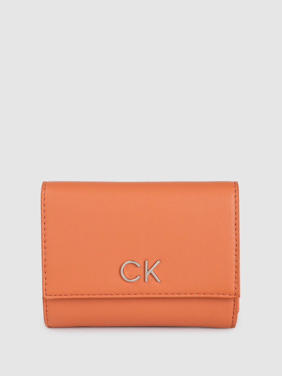 

Calvin Klein Women Solid Three Fold Wallet, Tan