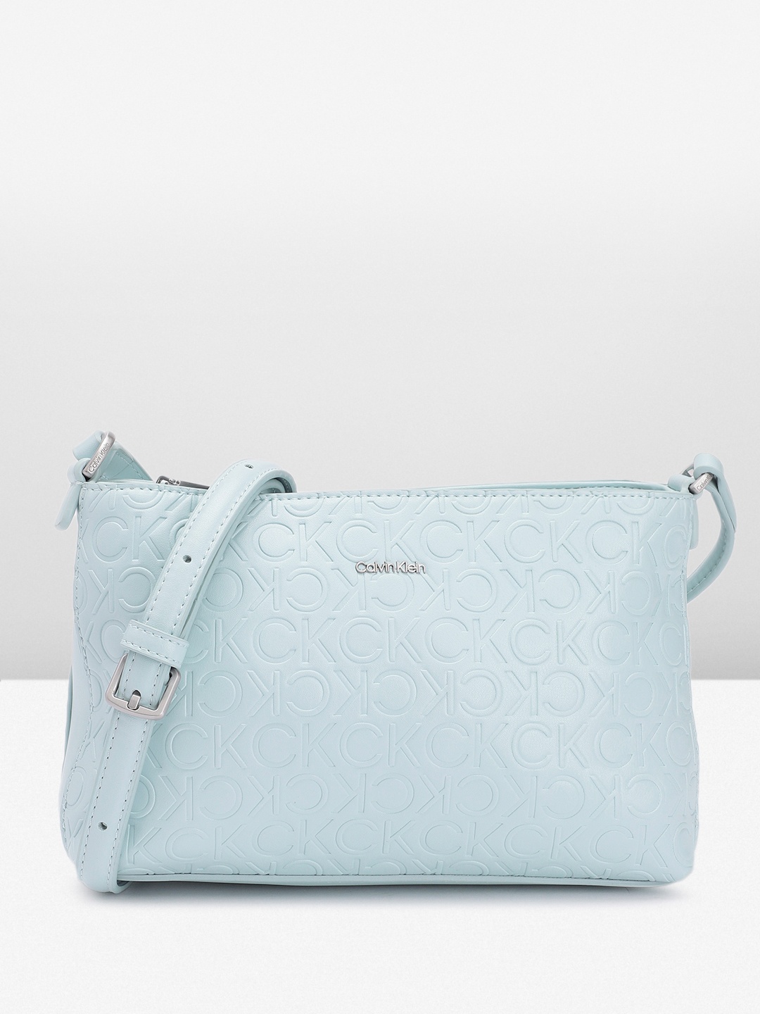 

Calvin Klein Women Textured Sling Bag, Blue