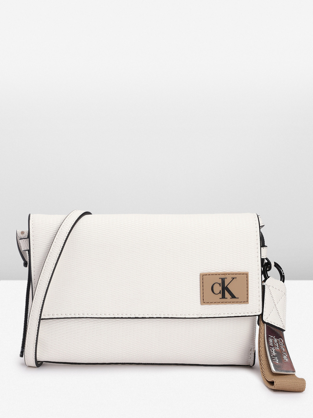 

Calvin Klein Textured Sling Bag, White