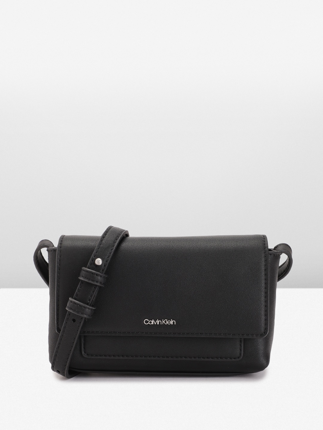 

Calvin Klein Solid Structured Sling Bag, Black