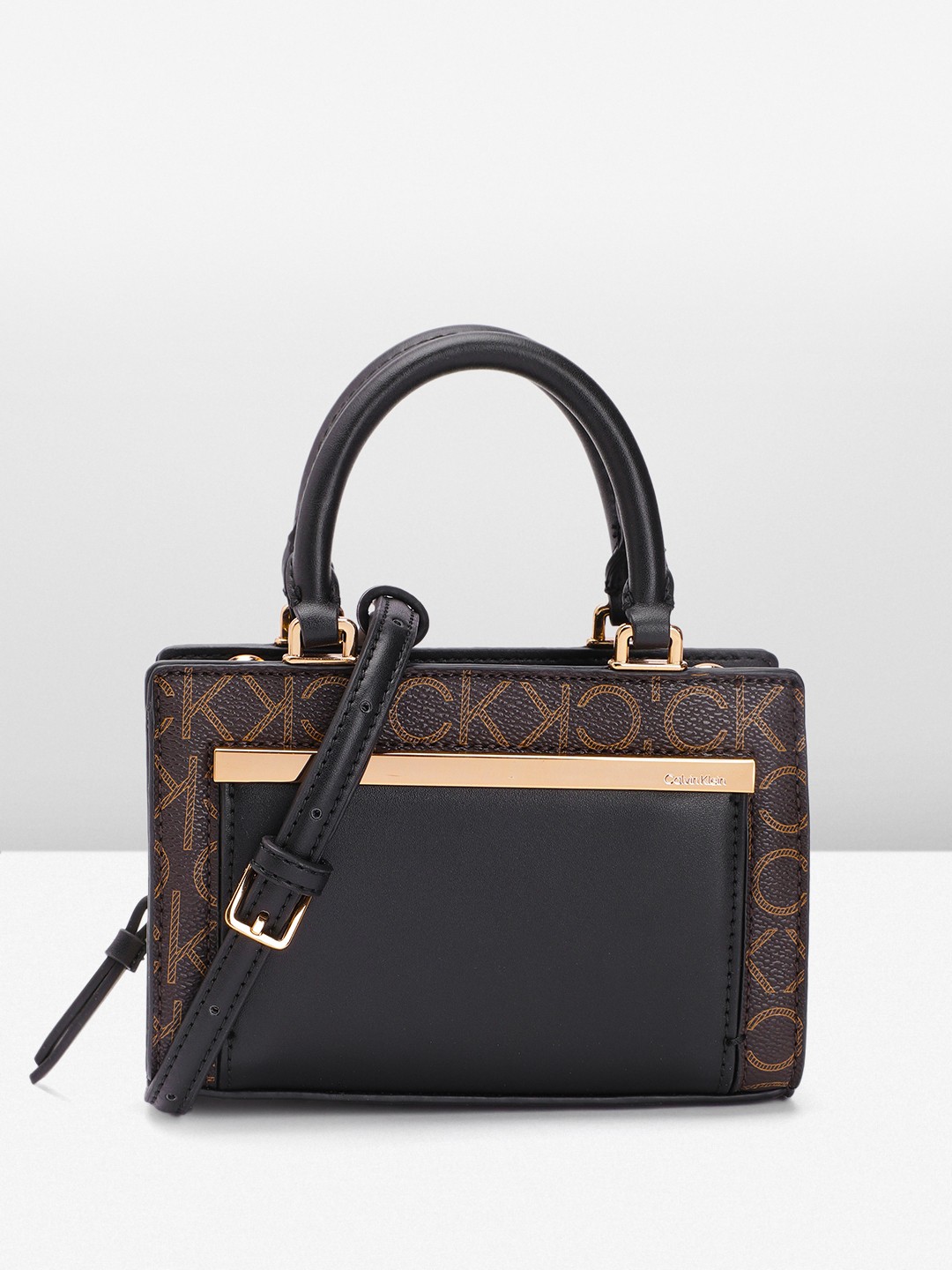 

Calvin Klein Women Printed Handheld Bag, Brown