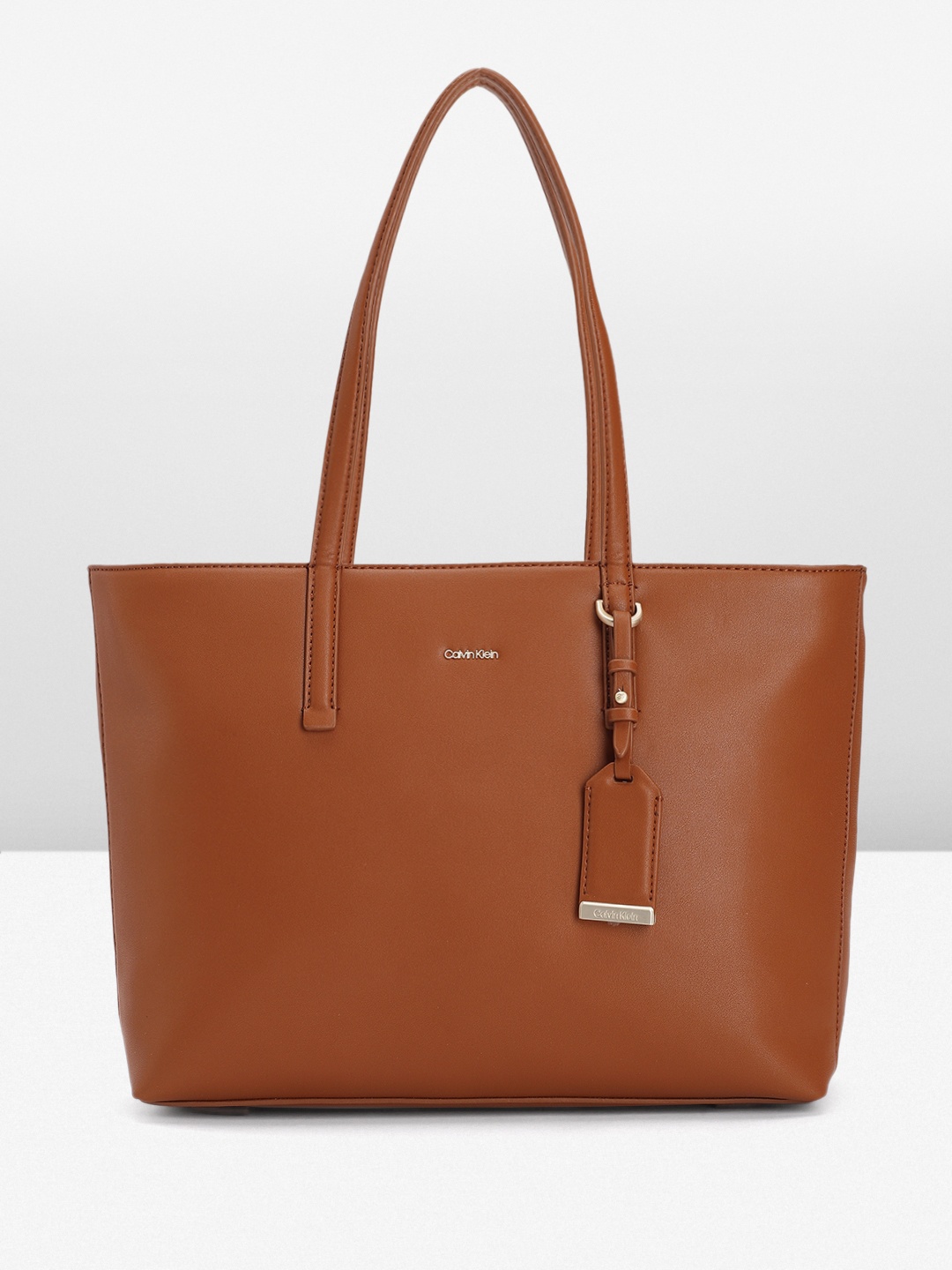 

Calvin Klein Women Solid Shoulder Bag, Brown