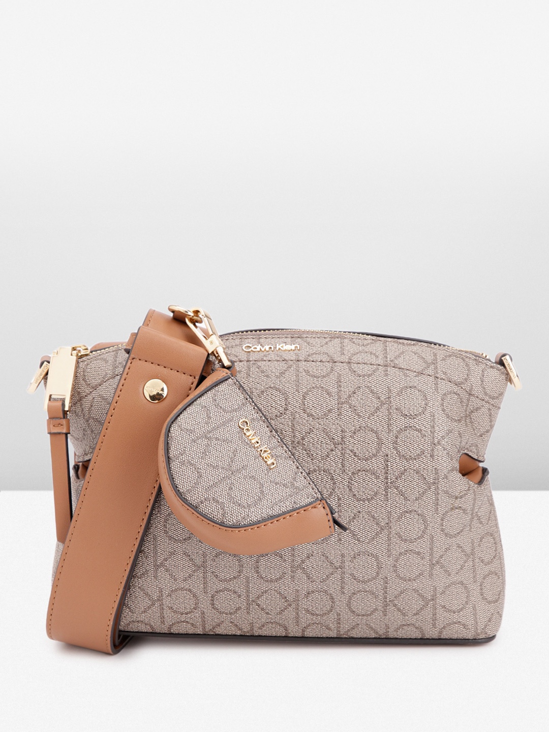 

Calvin Klein Women Printed Sling Bag, Taupe