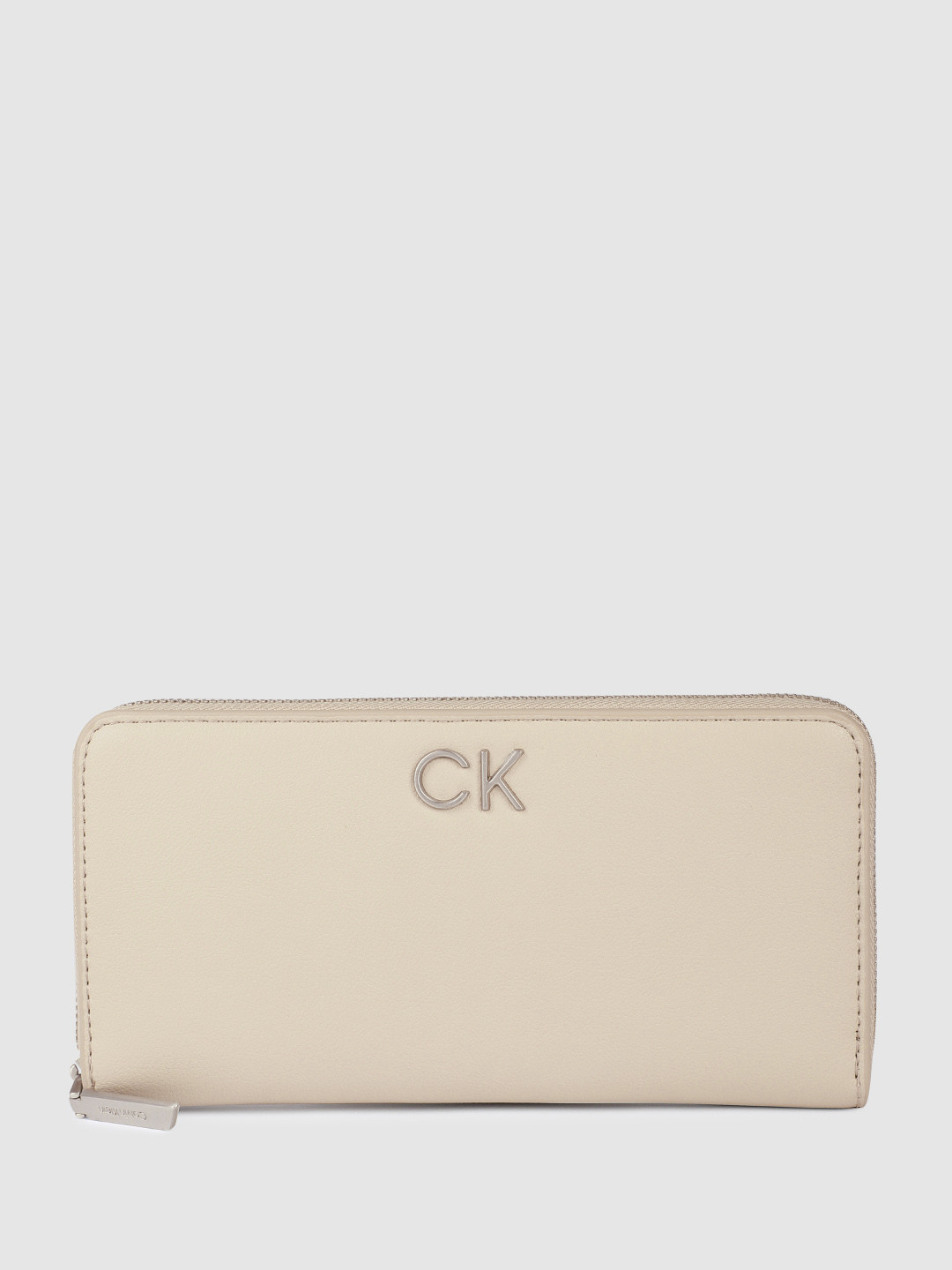 

Calvin Klein Women Solid Zip Around Wallet, Beige