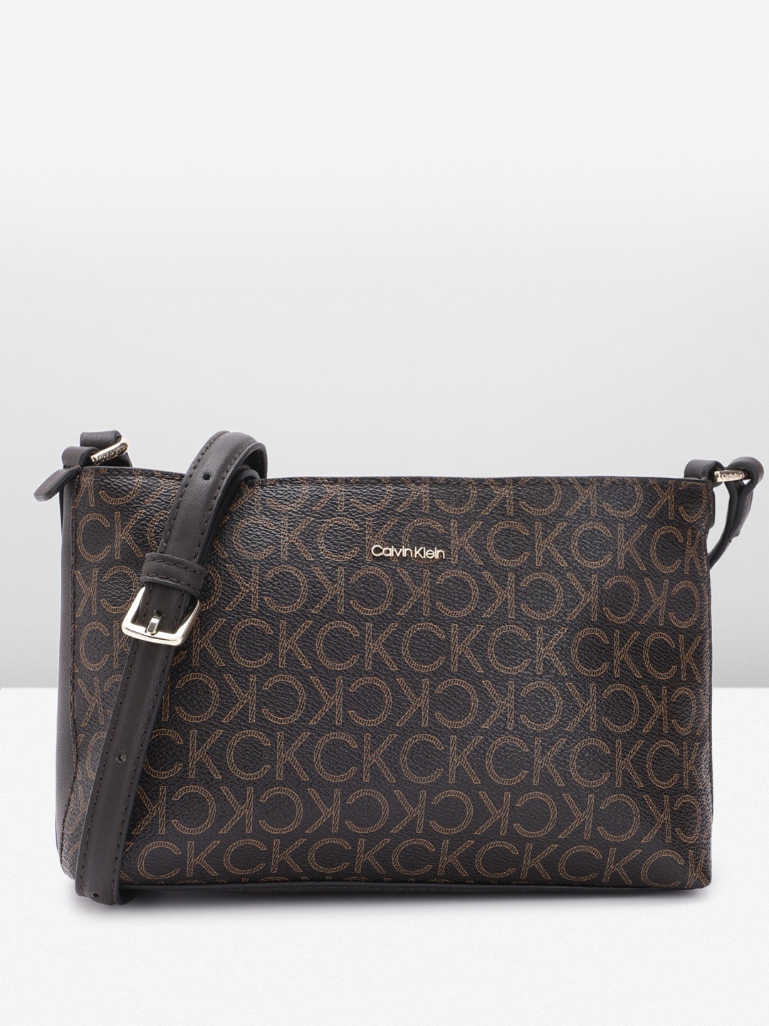 

Calvin Klein Women Printed Sling Bag, Brown
