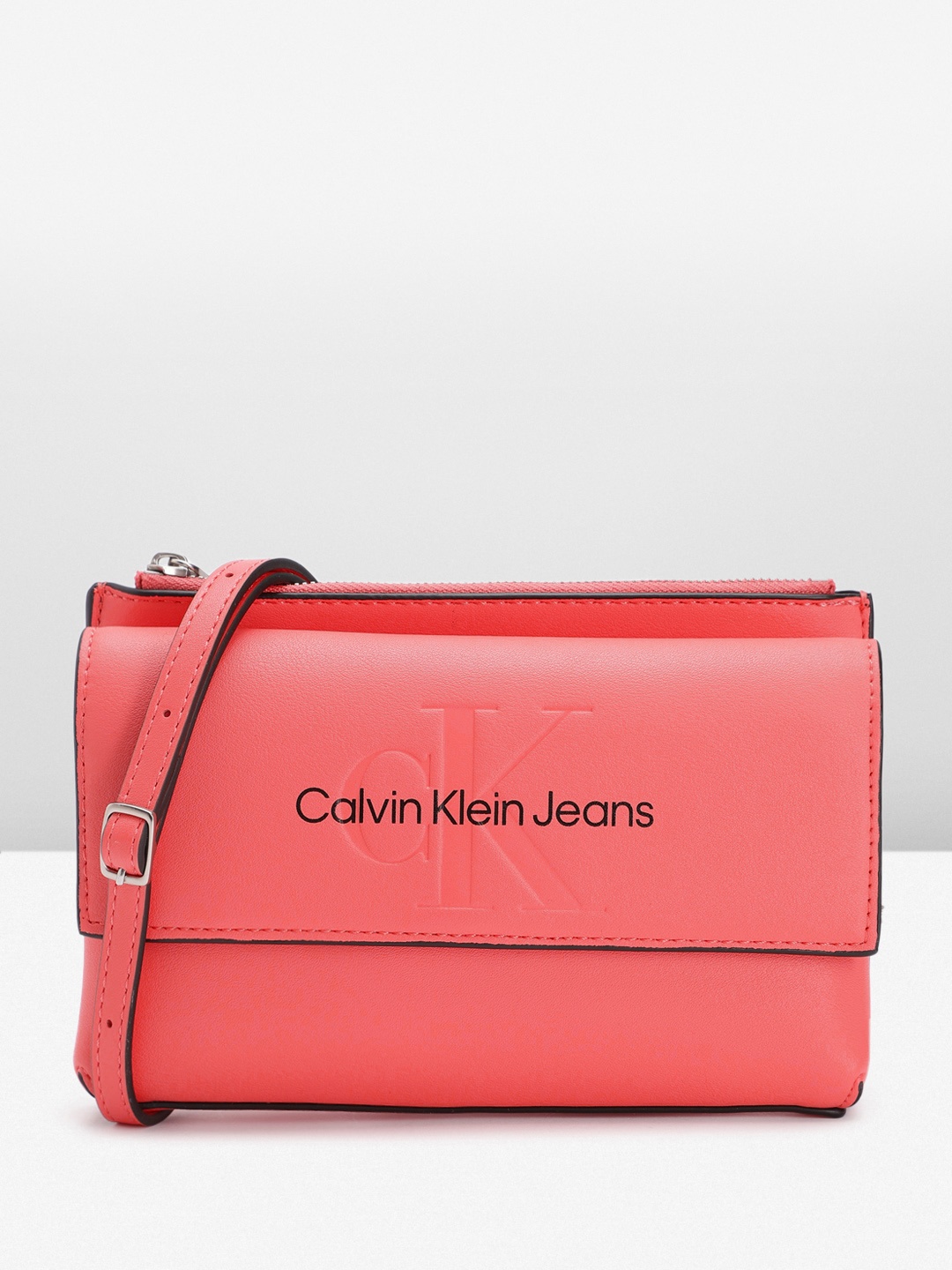 

Calvin Klein Women Brand Logo Printed Sling Bag, Pink