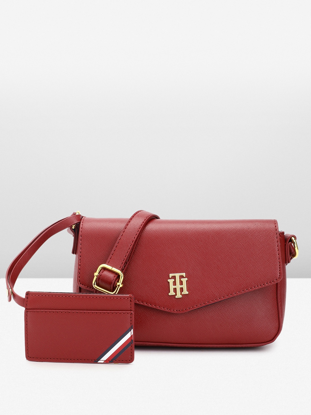 

Tommy Hilfiger Abstract Textured Structured Sling Bag, Maroon