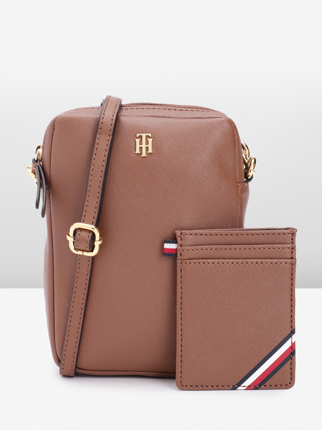

Tommy Hilfiger Women Solid Sling Bag, Brown