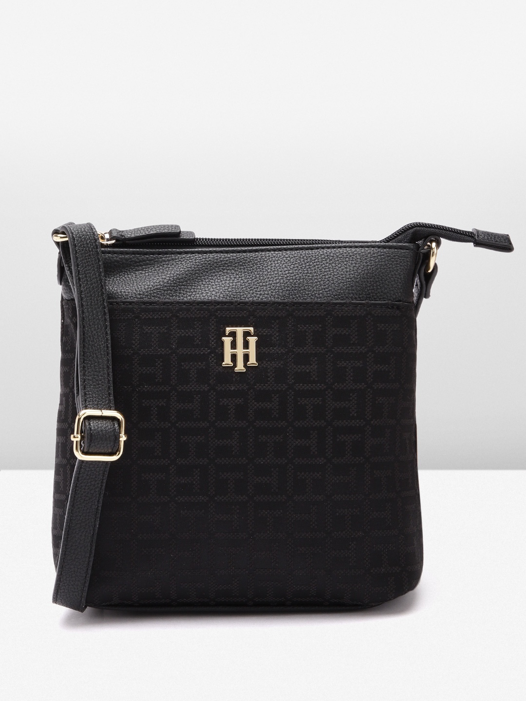 

Tommy Hilfiger Brand Logo Design Structured Sling Bag, Black
