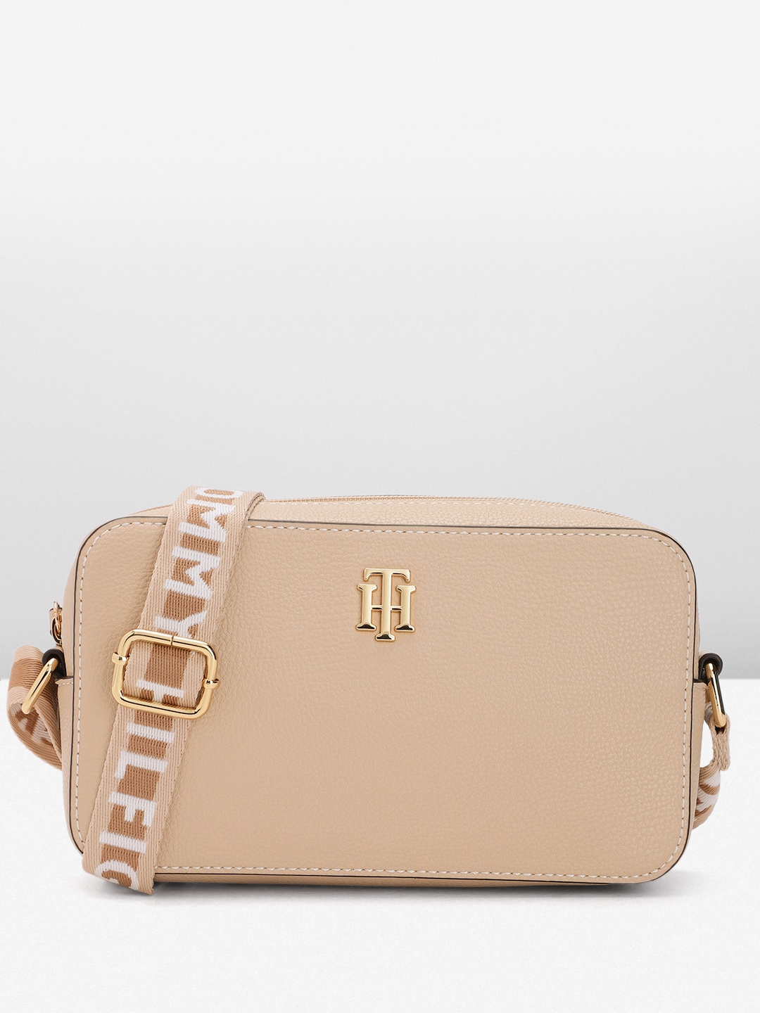 

Tommy Hilfiger Solid Structured Sling Bag, Beige