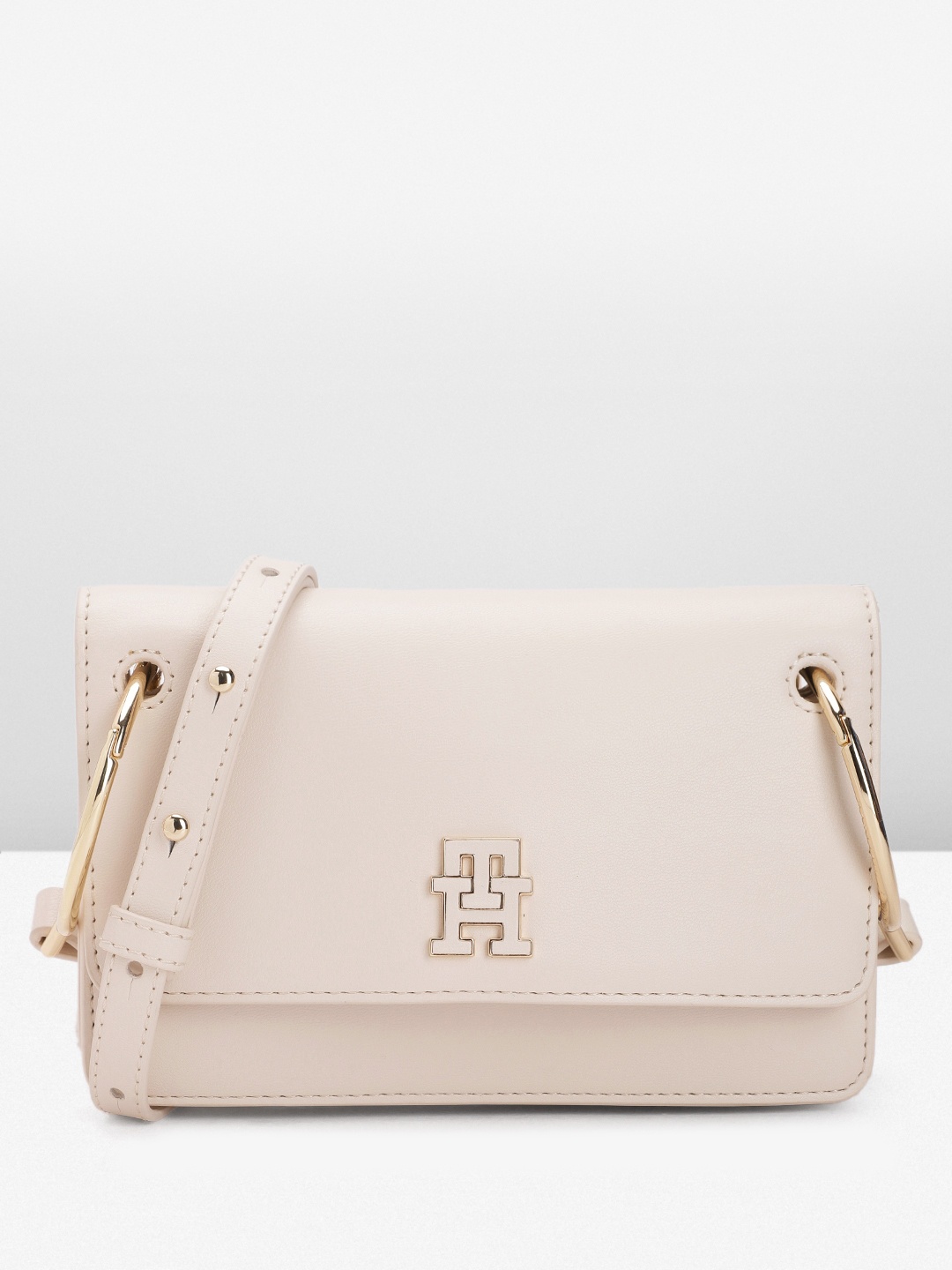 

Tommy Hilfiger Solid Structured Sling Bag, Off white