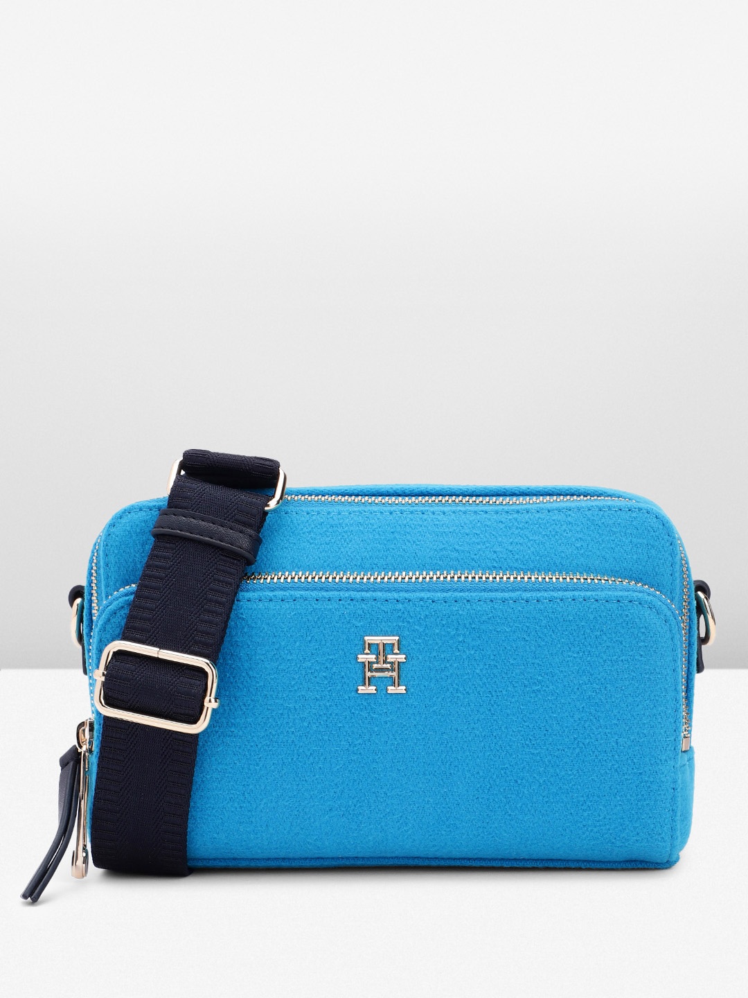 

Tommy Hilfiger Solid Structured Sling Bag, Blue