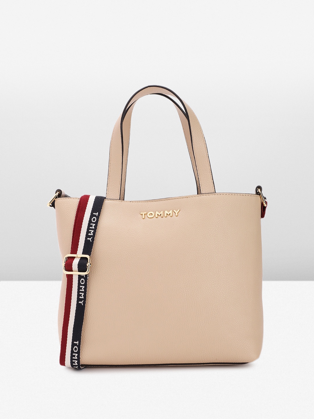 

Tommy Hilfiger Women Solid Handheld Bag, Beige