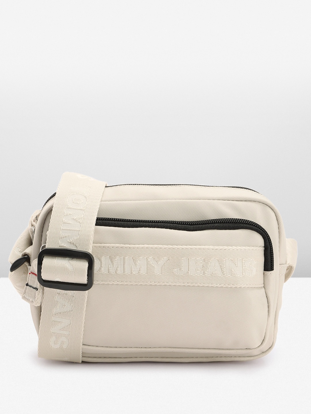 

Tommy Hilfiger Solid Structured Sling Bag, Beige
